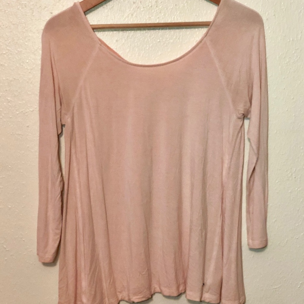 Flowy pink shirt.